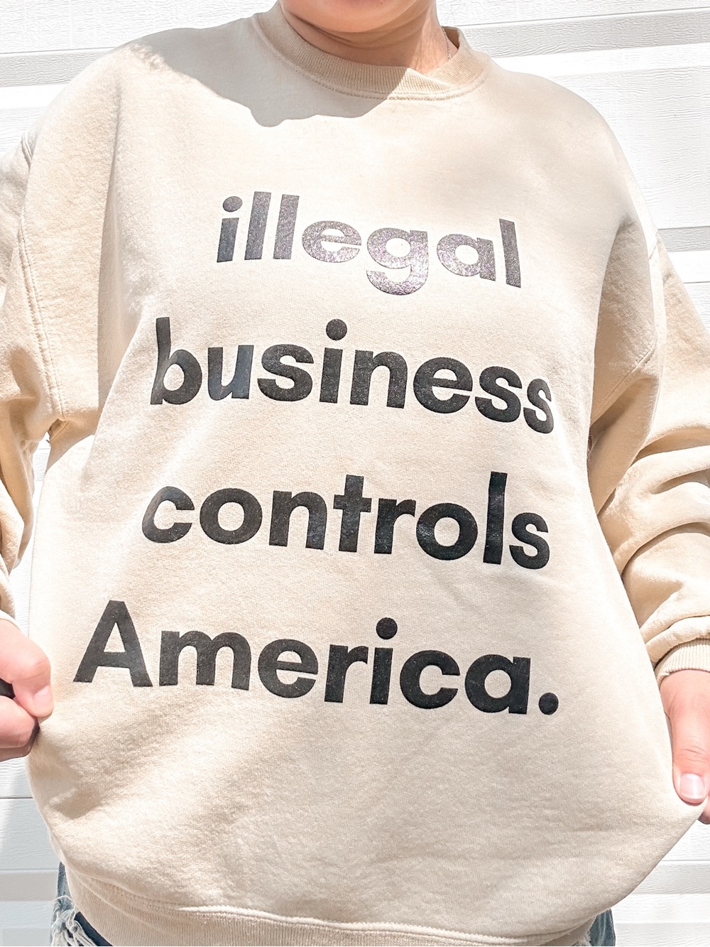 Illegal business controls America Crewneck